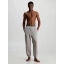 Pánske teplákové nohavice NM2459E PET béžová - Calvin Klein
