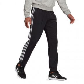 Pánske nohavice Essentials Tapered Cuff 3 Stripes M GK8980 čierne - Adidas