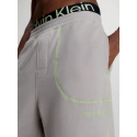 Pánske teplákové nohavice NM2459E PET béžová - Calvin Klein